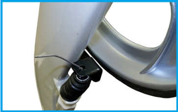 Running the cable through the cable adjuster and spring